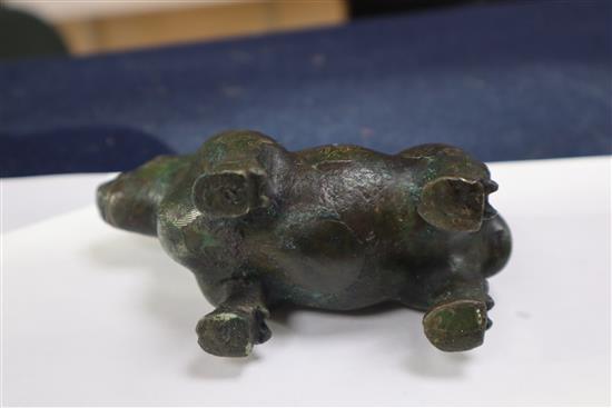 A Chinese gold and silver inlaid bronze figure of a tapir, Han dynasty or later, L. 12cm, excluding hardwood stand and fitted box